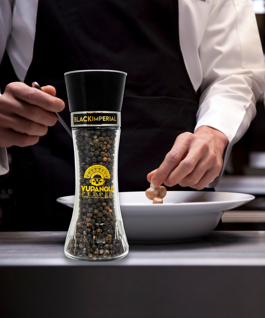 Chef cooking with Yupanqui Black Imperial whole black peppercorns